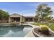 An inviting pool with lush landscaping and a covered patio that makes for an ideal outdoor space at 2727 S Balboa Dr, Gilbert, AZ 85295