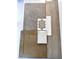 An assortment of interior selections, including flooring, tile, counter, and cabinet samples at 299 W Flax Dr, San Tan Valley, AZ 85140