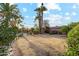 A large backyard with mature trees and a pool at 3146 W Paradise Dr, Phoenix, AZ 85029