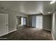 Bedroom featuring mirrored closet doors and a sliding glass door at 3420 W Danbury Dr # C218, Phoenix, AZ 85053
