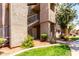 Well-maintained building entrance with stairs and lush landscaping, creating a welcoming ambiance at 3830 E Lakewood Pkwy # 1057, Phoenix, AZ 85048