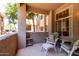 Charming outdoor patio with comfortable seating and views of the complex at 3830 E Lakewood Pkwy # 1057, Phoenix, AZ 85048