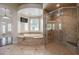 A bathroom features a bathtub, shower, and tile flooring at 3949 E Norcroft Cir, Mesa, AZ 85215