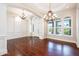 Spacious foyer with hardwood floors, arched entry, recessed lighting, and view to front door at 3949 E Norcroft Cir, Mesa, AZ 85215