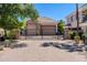 Spacious three-car garage with an automatic gate at 3949 E Norcroft Cir, Mesa, AZ 85215