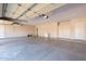 Spacious three car garage with built-in storage cabinets at 3949 E Norcroft Cir, Mesa, AZ 85215