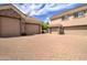 Spacious garages with stone accents and a large brick driveway offer ample parking at 3949 E Norcroft Cir, Mesa, AZ 85215
