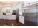 Modern kitchen featuring stainless steel appliances and ample cabinet space at 3949 E Norcroft Cir, Mesa, AZ 85215
