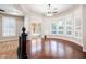 Second story living area features hardwood floors and natural light streaming in from exterior at 3949 E Norcroft Cir, Mesa, AZ 85215