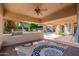 Outdoor kitchen and patio area with built-in barbecue and view of pool at 3949 E Norcroft Cir, Mesa, AZ 85215