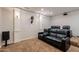 Luxurious home theater seating with cup holders, wall sconces, and overhead projector at 3949 E Norcroft Cir, Mesa, AZ 85215