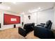 Home theater boasts comfortable seating, sconce lighting, and recessed ceiling lights at 3949 E Norcroft Cir, Mesa, AZ 85215