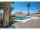 Beautiful pool and tropical palm trees create a private outdoor escape at 4319 E Tanglewood Dr, Phoenix, AZ 85048