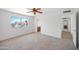 Bedroom featuring carpet floors, natural lighting, and standard closet at 4319 E Tanglewood Dr, Phoenix, AZ 85048