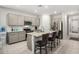 Modern kitchen featuring stainless steel appliances, a large island with seating, and ample cabinet space at 4701 S Siphon Draw Rd, Apache Junction, AZ 85119