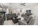 Bright and airy living room with comfortable seating, modern decor, and an open layout to the dining area at 4701 S Siphon Draw Rd, Apache Junction, AZ 85119