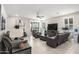 Spacious living room with plush seating, recessed lighting, plantation shutters, and stylish decor at 4701 S Siphon Draw Rd, Apache Junction, AZ 85119