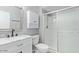 Clean bathroom equipped with a modern vanity, marble countertop, and glass shower at 4815 W Charleston Ave, Glendale, AZ 85308