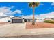 Single-story home featuring a two-car garage, low maintenance landscaping, and a lovely curb appeal at 4815 W Charleston Ave, Glendale, AZ 85308