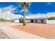Charming single-story home featuring a well-maintained front yard, beautiful landscaping, and a lovely curb appeal at 4815 W Charleston Ave, Glendale, AZ 85308