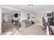 Inviting living room with an open layout, neutral carpet, and ample space for relaxation and entertainment at 4815 W Charleston Ave, Glendale, AZ 85308