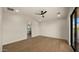Spacious bedroom featuring modern finishes, a ceiling fan, and natural light at 4911 E Amelia Ave, Phoenix, AZ 85018