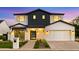 Stunning two-story modern home with a well-manicured lawn and a symmetrical design at 4911 E Amelia Ave, Phoenix, AZ 85018