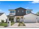 Stunning two-story home with modern design elements and professional landscaping at 4911 E Amelia Ave, Phoenix, AZ 85018