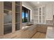 Close up of custom cabinets and modern faucet in gourmet kitchen at 4911 E Amelia Ave, Phoenix, AZ 85018