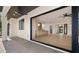 Bright, open living space with sliding glass doors merging indoor/outdoor living spaces at 4911 E Amelia Ave, Phoenix, AZ 85018