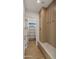 Organized mudroom with custom cabinetry, bench, and convenient storage solutions at 4911 E Amelia Ave, Phoenix, AZ 85018