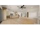 Open concept living space showcasing the kitchen, living room, and dining area at 4911 E Amelia Ave, Phoenix, AZ 85018