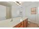 Bathroom featuring a double sink vanity, a large mirror and a view of the shower at 5123 W Novak Way, Laveen, AZ 85339