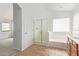 Bathroom featuring a shower and tub combination, with a tiled floor and vanity at 5123 W Novak Way, Laveen, AZ 85339