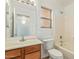 Bathroom with a single sink vanity, toilet, and tub with shower at 5123 W Novak Way, Laveen, AZ 85339