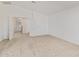 Bright, carpeted bedroom with neutral walls and an open doorway at 5123 W Novak Way, Laveen, AZ 85339