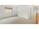 Bedroom featuring carpet floors, a window with blinds, and a closet at 5123 W Novak Way, Laveen, AZ 85339