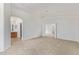Spacious carpeted bedroom with access to the bathroom and hallway at 5123 W Novak Way, Laveen, AZ 85339