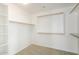 Walk-in closet features adjustable shelving and carpeted flooring at 5123 W Novak Way, Laveen, AZ 85339