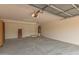 Spacious two-car garage with water heater, overhead storage, and ample room for vehicles and other storage needs at 5123 W Novak Way, Laveen, AZ 85339