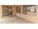 Covered patio with a sliding glass door and windows that provide access to the interior of the house at 5123 W Novak Way, Laveen, AZ 85339