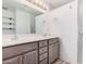 Bathroom features a double sink vanity with shower at 6101 W Sunnyside Dr, Glendale, AZ 85304