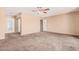 Large bedroom with carpet, ceiling fan, and closet space at 6101 W Sunnyside Dr, Glendale, AZ 85304