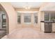 Cozy dining area with bay windows and a view of the backyard pool at 6101 W Sunnyside Dr, Glendale, AZ 85304