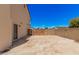 Large driveway with privacy gate, offering ample parking and security for the property at 6101 W Sunnyside Dr, Glendale, AZ 85304
