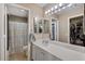 Bright bathroom featuring a large countertop and a shower/tub combination at 612 E Racine Pl, Casa Grande, AZ 85122