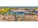 Aerial view of a luxurious property with a pool, outdoor kitchen, and landscaped backyard at 6320 E Gloria Ln, Cave Creek, AZ 85331