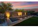 Bocce ball court with wooden borders and lights; perfect for evening games in a private backyard setting at 6320 E Gloria Ln, Cave Creek, AZ 85331