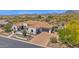Stunning home boasts a desert landscape, tile roof, paver driveway, and mountain views at 6320 E Gloria Ln, Cave Creek, AZ 85331