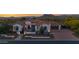 Charming home boasts a landscaped yard, tile roof, paver driveway, and scenic views at 6320 E Gloria Ln, Cave Creek, AZ 85331